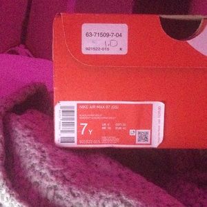 These are a size 7 in boys. NIKE AIR MAX 97 (GS)